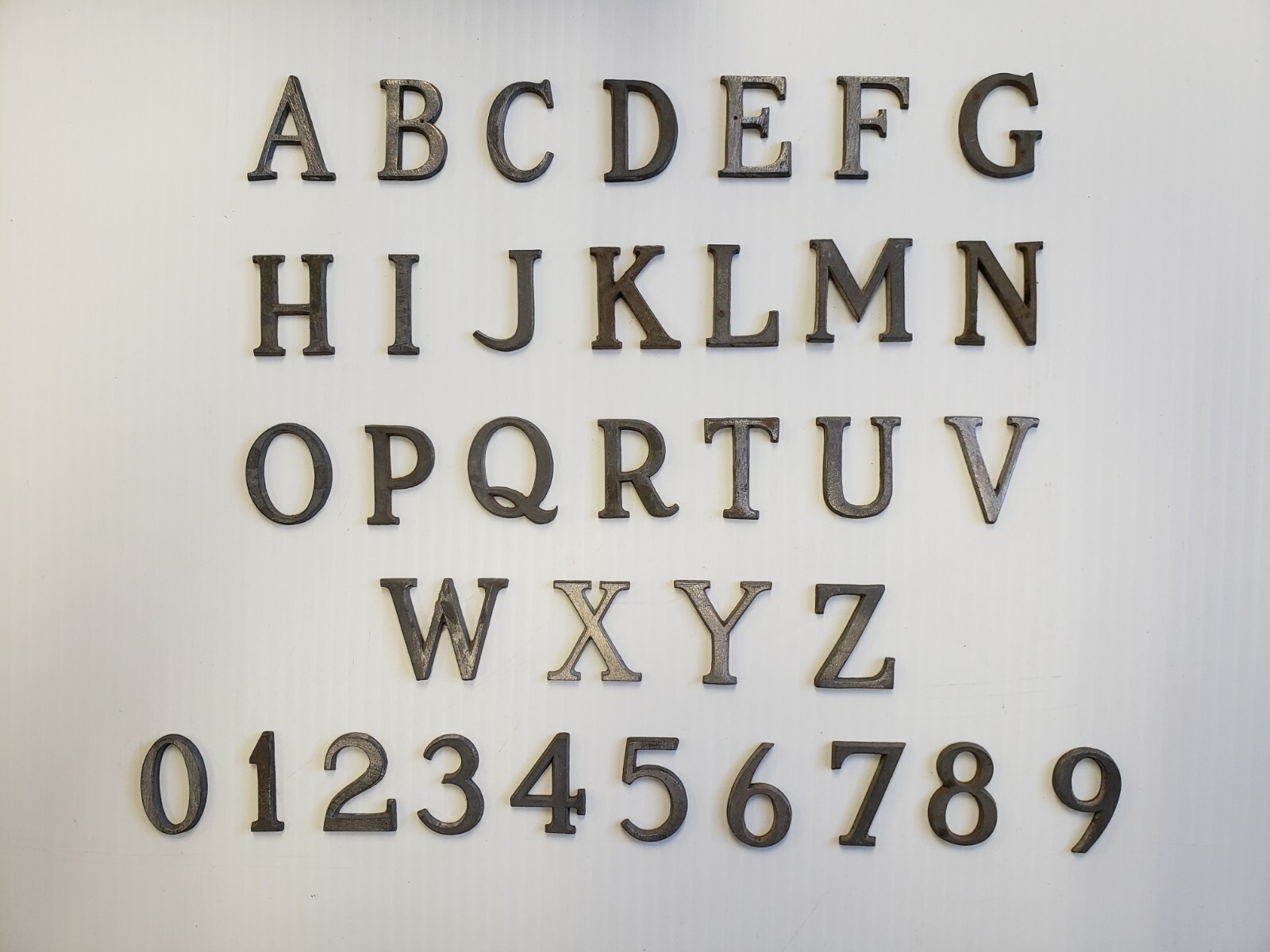 Metal Letters and Numbers 1 3/8 inch long Roman Font price per letter*
