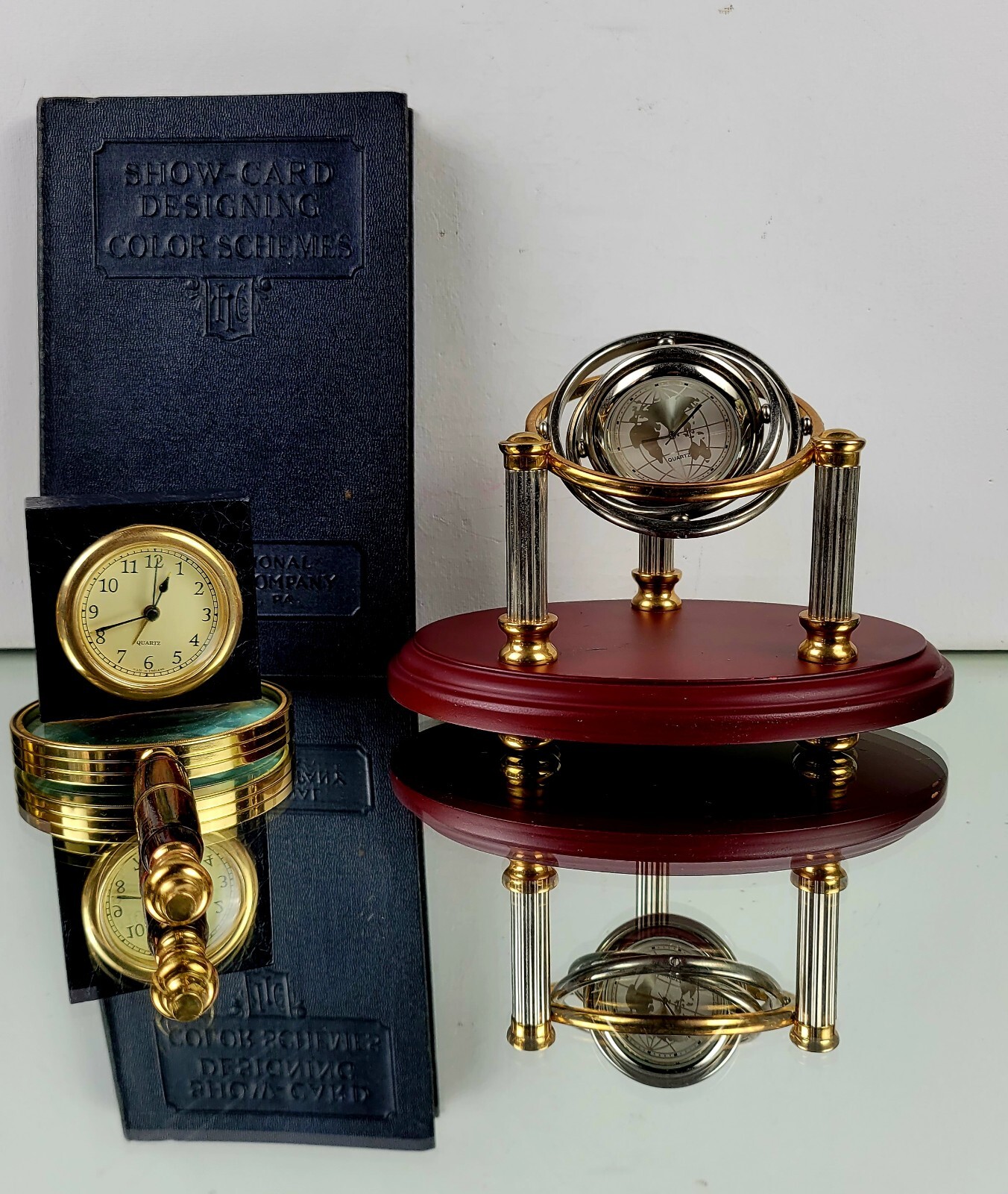 Gyroscopic Desk Clock – Two Toned Metalwork, World Map Face, Wooden Base