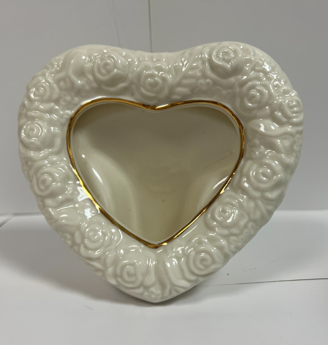 Ceramic Heart Frame – Holds 3″ W x 2-1/2″ H Photo by INTERNATIONAL SILVER