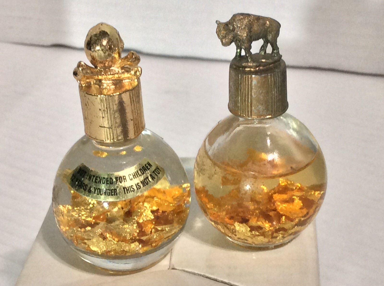 2 Genuine 1 Oz. Miner’s Assay Bottle Gold Flakes Pirate’s Booty Skull & Buffalo