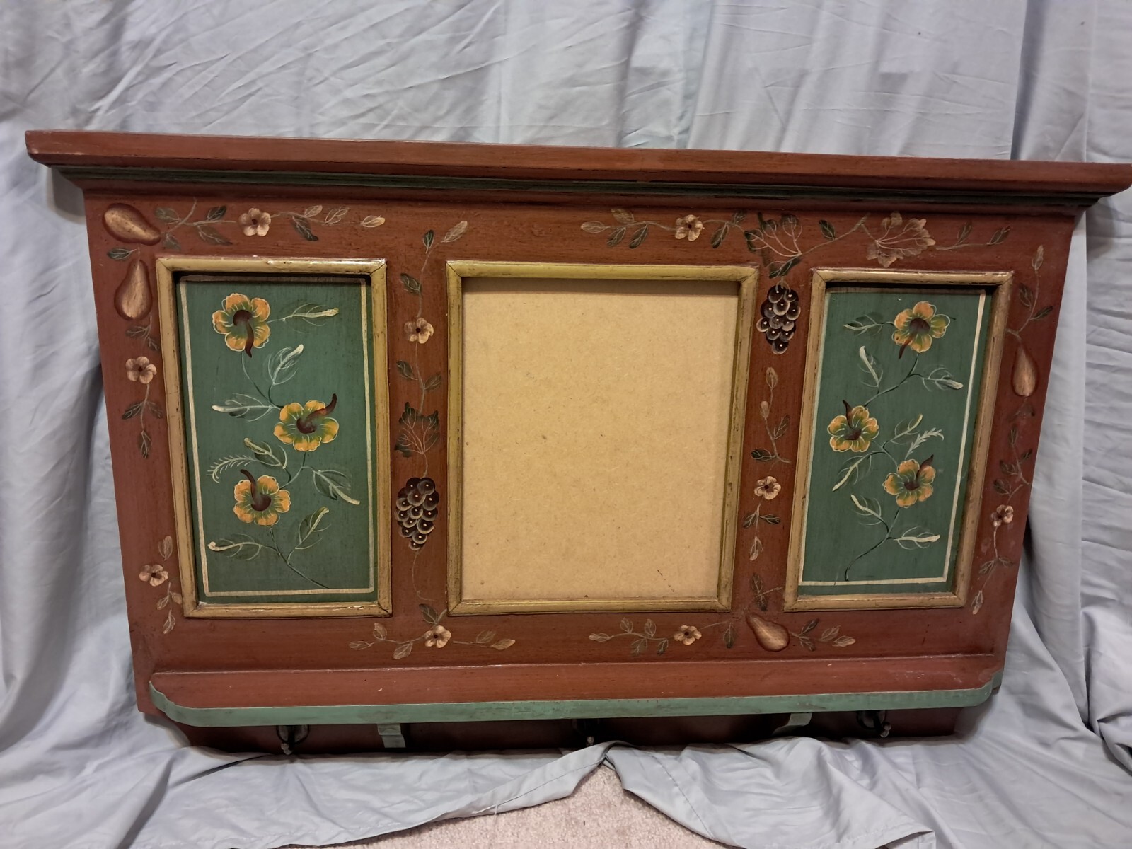 Vintage floral shaker board with coat hooks, wood, green accents