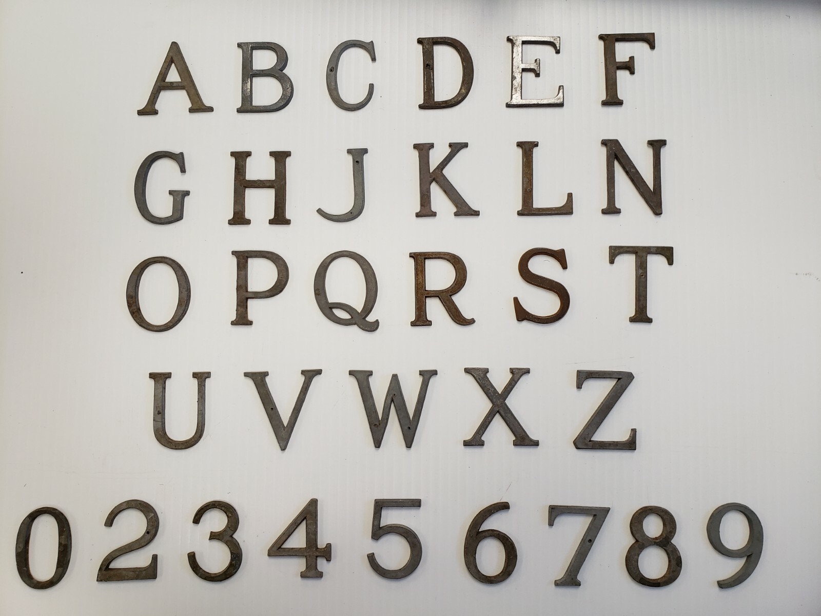 Metal Letters and Numbers 1 3/4 inch long Roman Font price per letter*