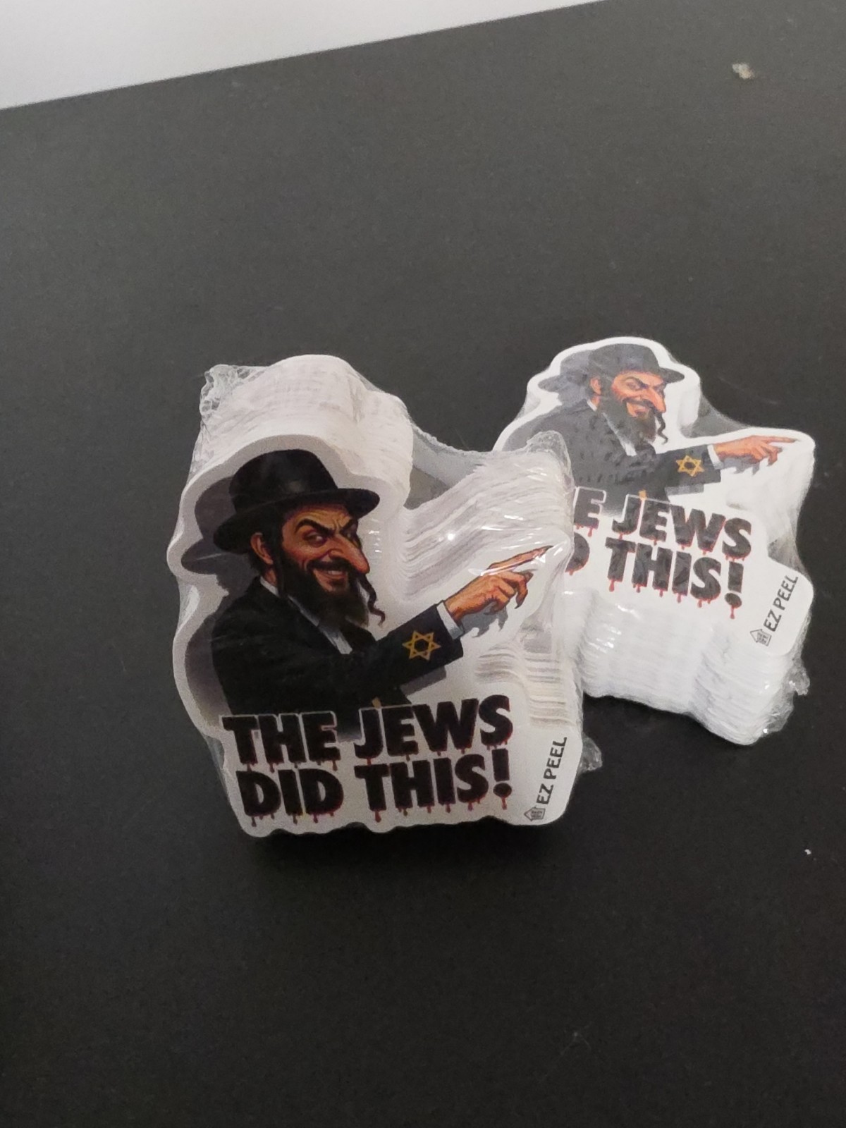”The Jews Did This!” Gas Pump Stickers