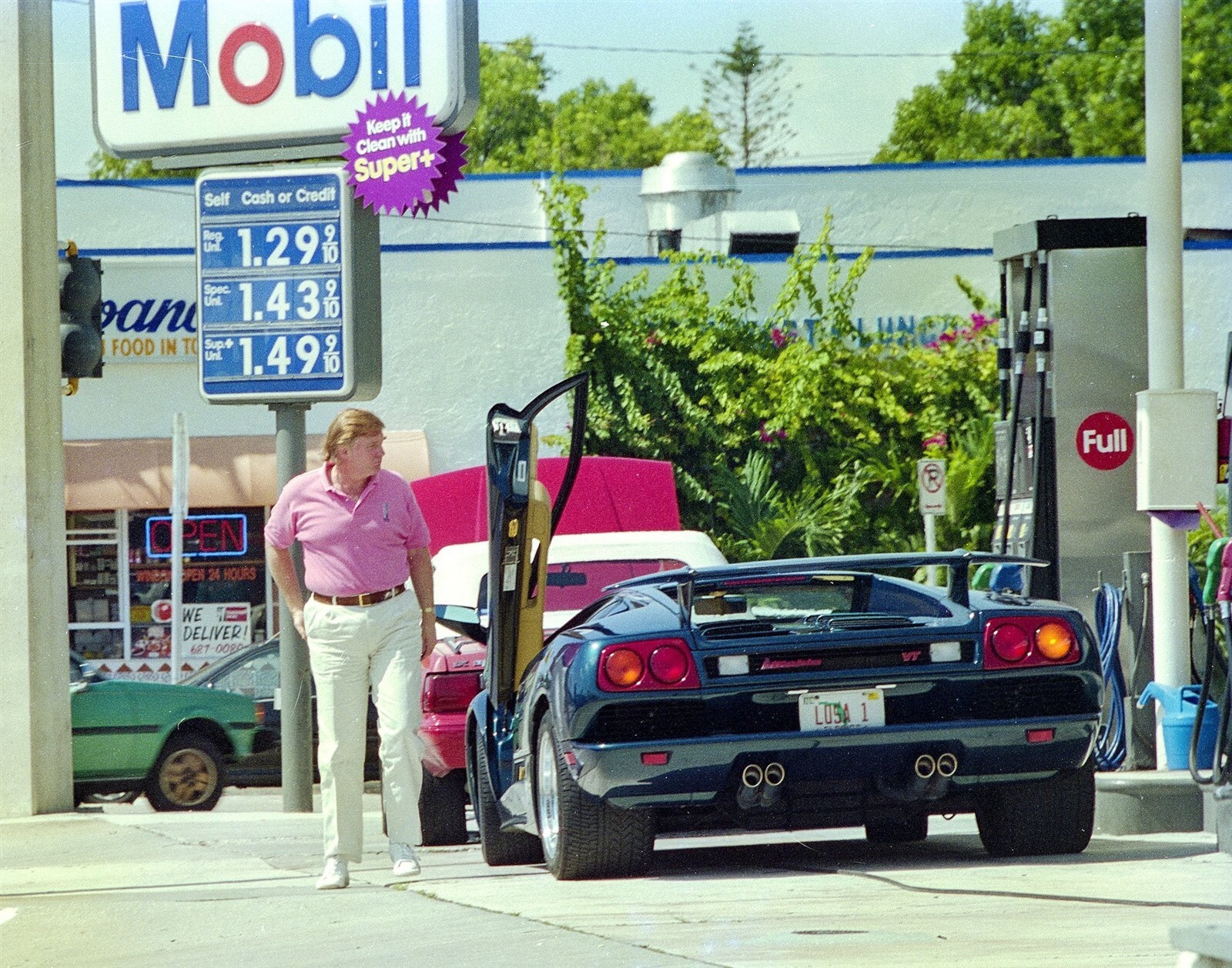 Donald Trump Pumping Gas GLOSSY POSTER PICTURE PHOTO PRINT BANNER 14625